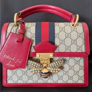 Authentic Gucci ‘Queen Margaret’ red top handle shoulder bag.